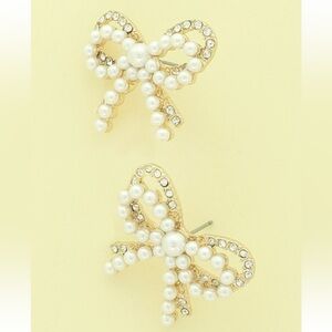 915. Pearl rhinestone pave bow post earrings